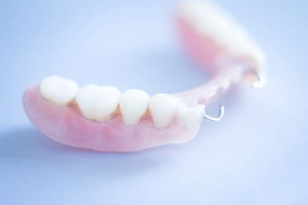 Should I Get Dentures Or Dental Implants